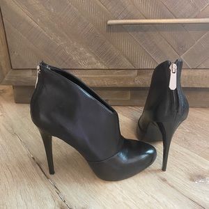 Black, stiletto leather booties from Guess